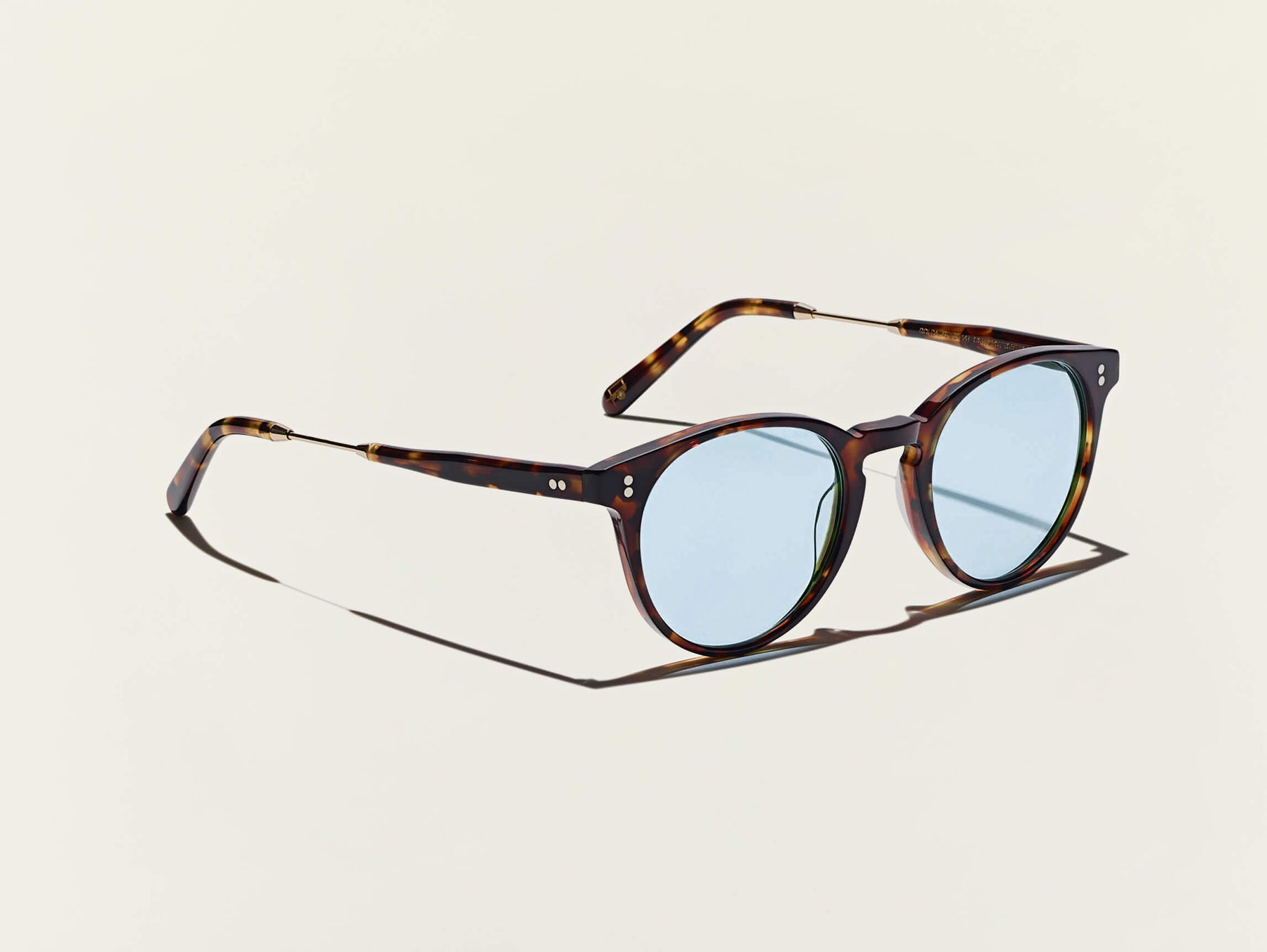 The GOLDA SUN in Spot Tortoise with Blue Glass Lenses