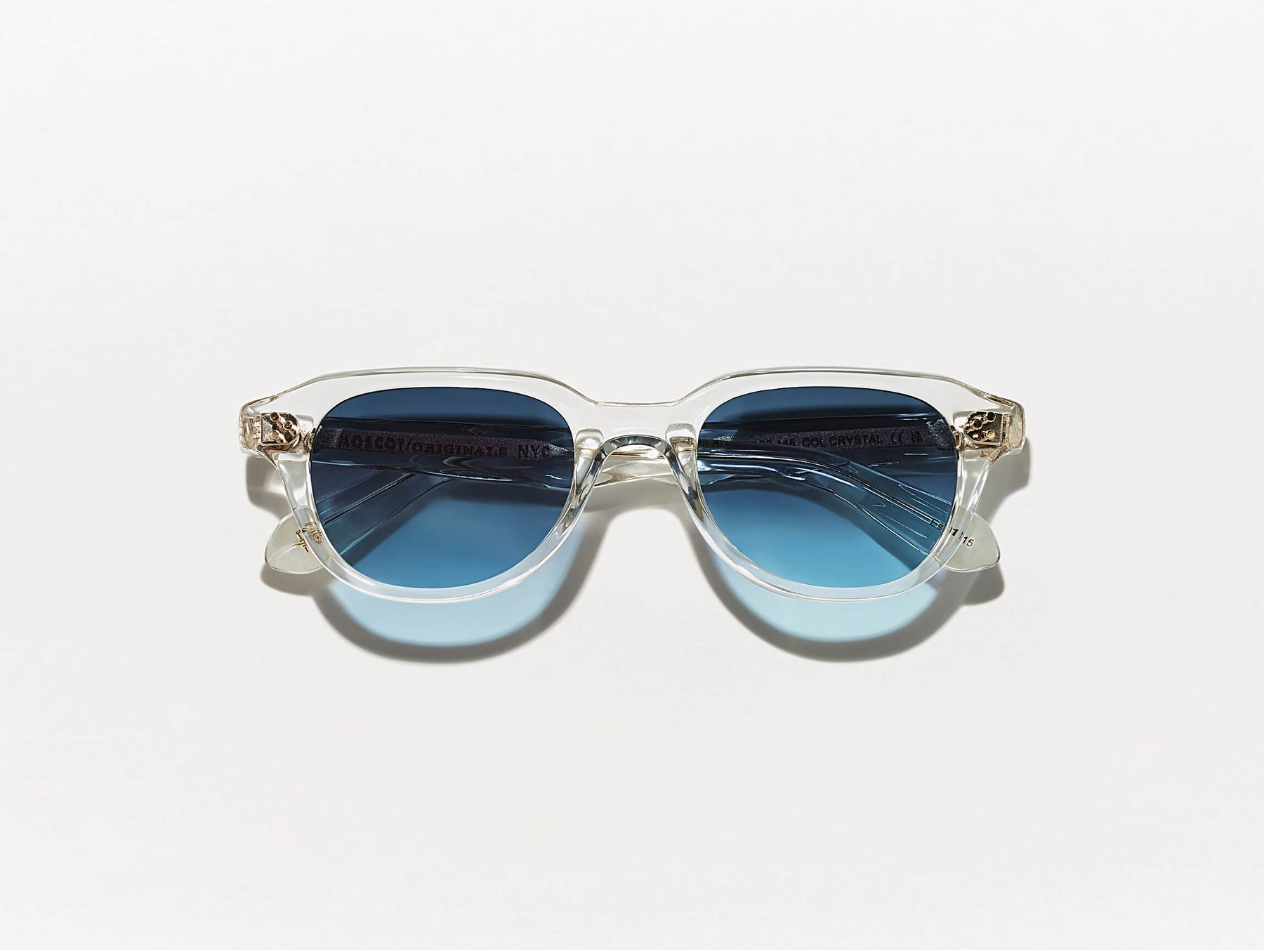 The GOOLAH SUN in Crystal with Denim Blue Tinted Lenses