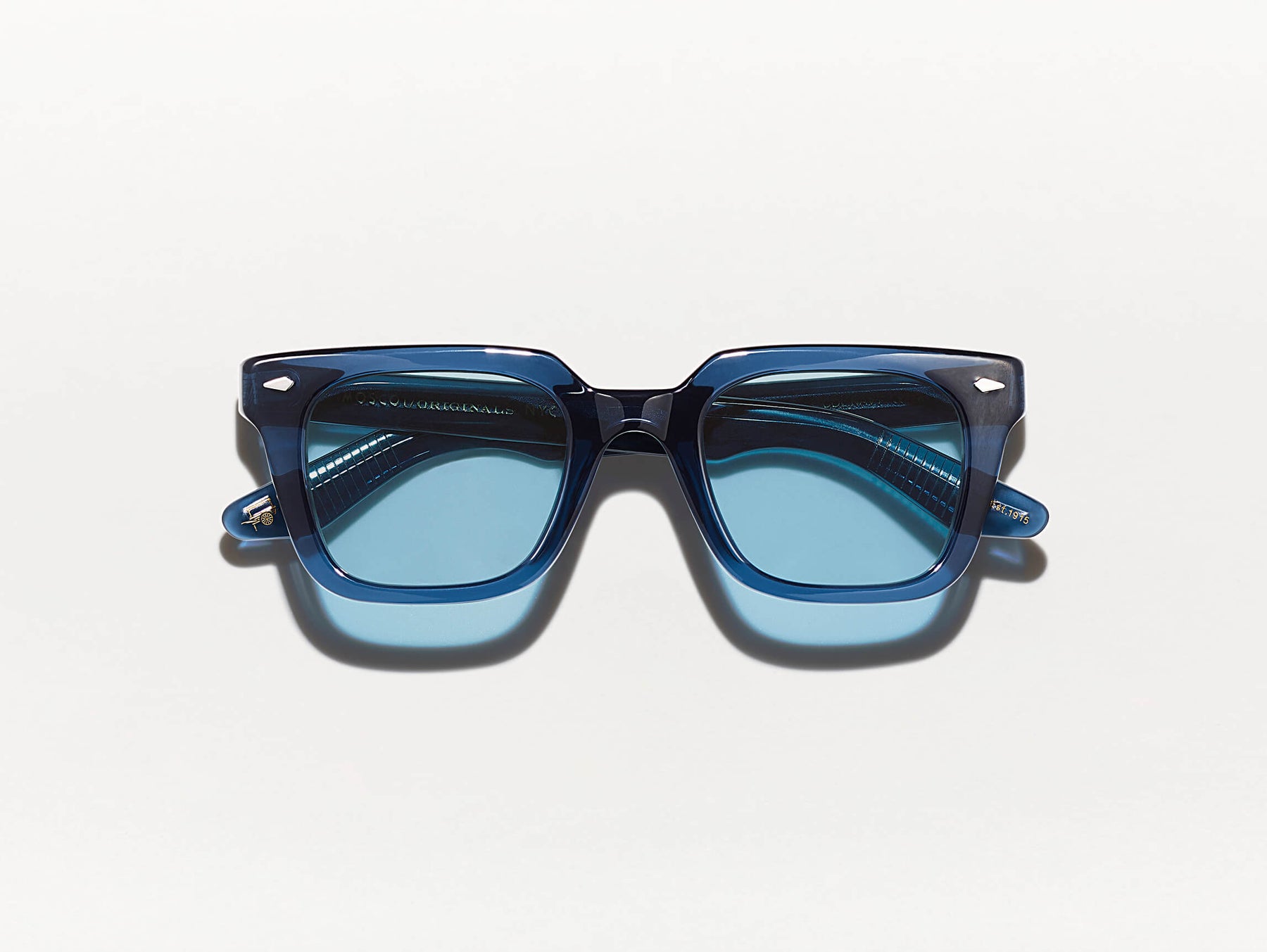 The GROBER SUN in Navy with Celebrity Blue Tinted Lenses