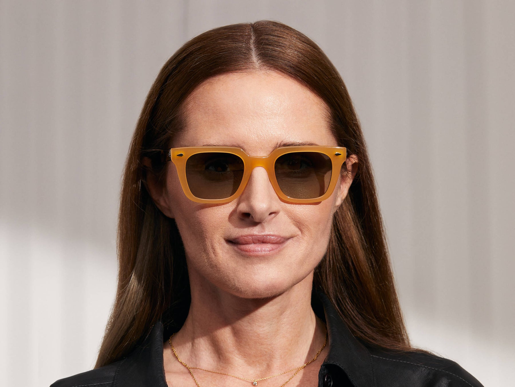 Model is wearing The GROBER SUN in Honey/Tortoise in size 48 with Forest Wood Tinted Lenses