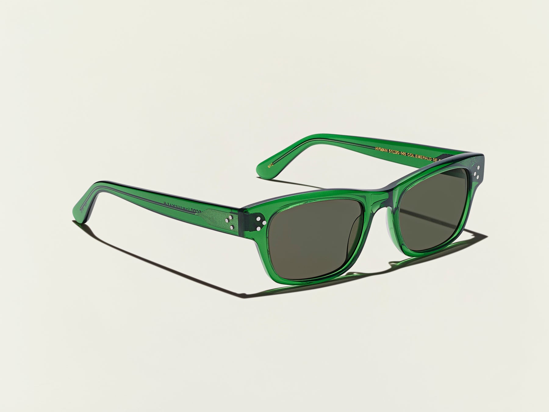 The HYMAN SUN in Emerald with G-15 Glass Lenses