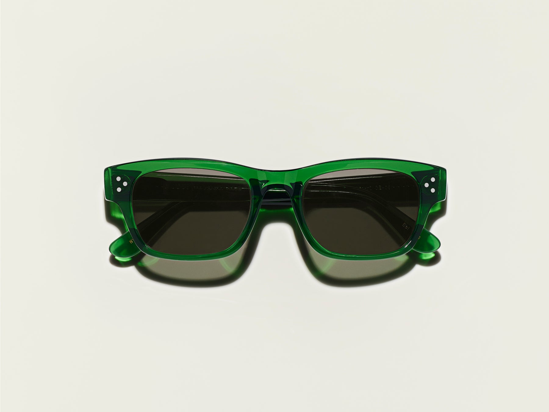 The HYMAN SUN in Emerald with G-15 Glass Lenses