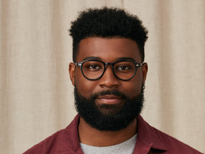 Model is wearing The KASH in size 50 in Black/Gold