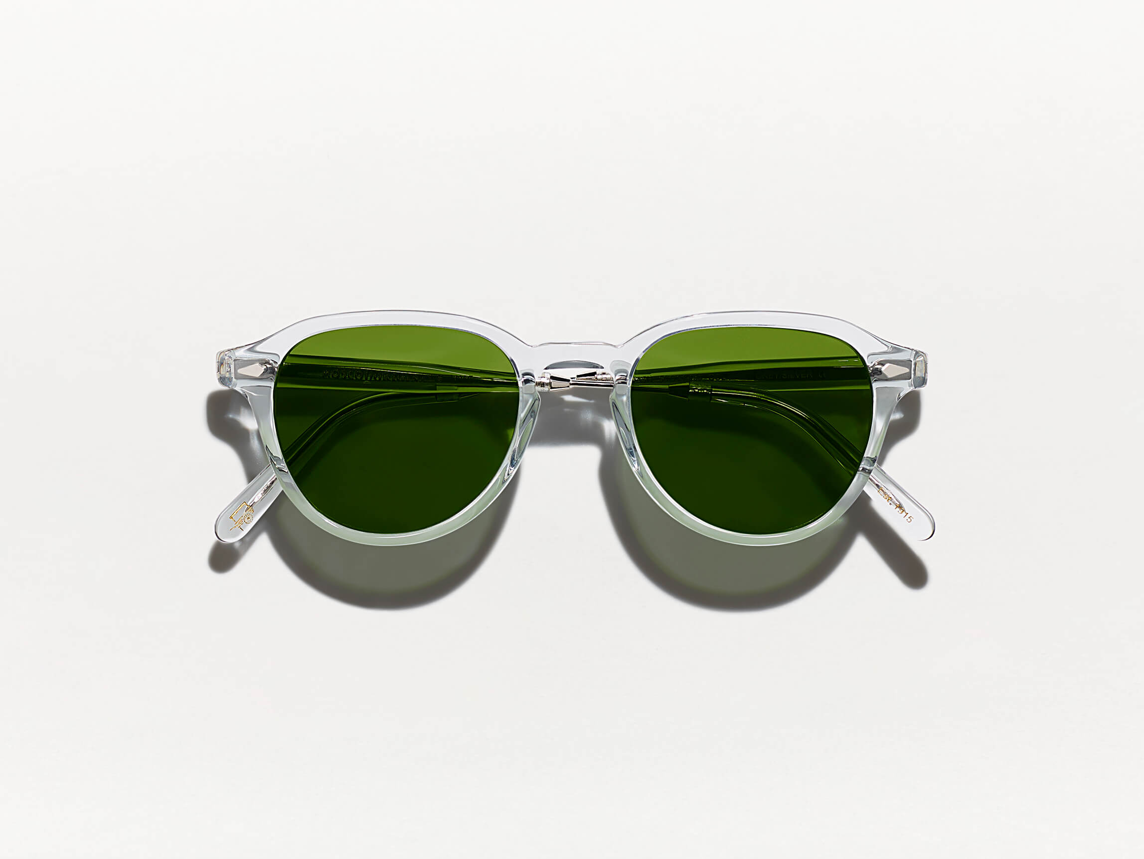 The KASH SUN in Light Grey/SIlver with Calibar Green Glass Lenses