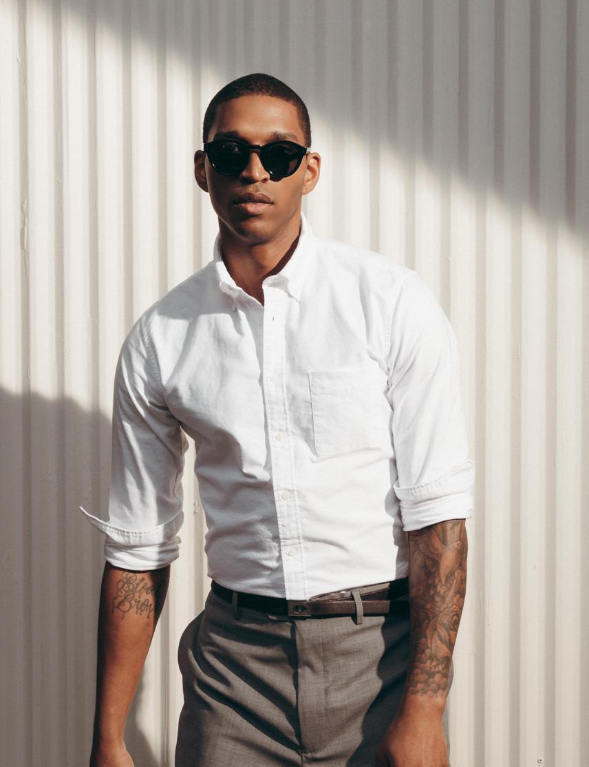 Model is wearing The KEPPE SUN in Black in size 48 with G-15 Glass Lenses