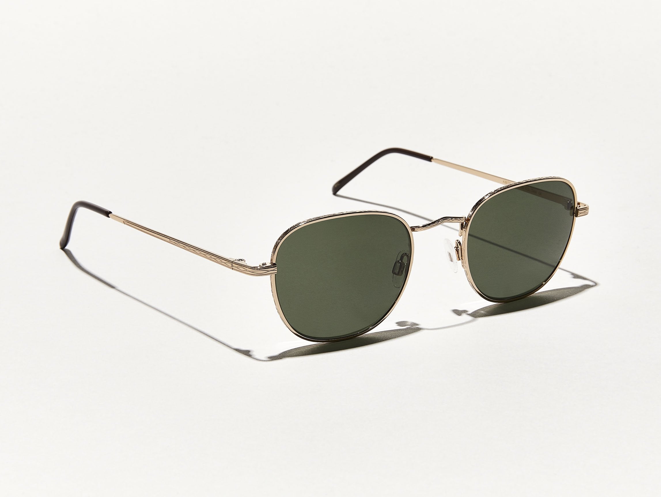 The KIBITS SUN in Gold with G-15 Glass Lenses
