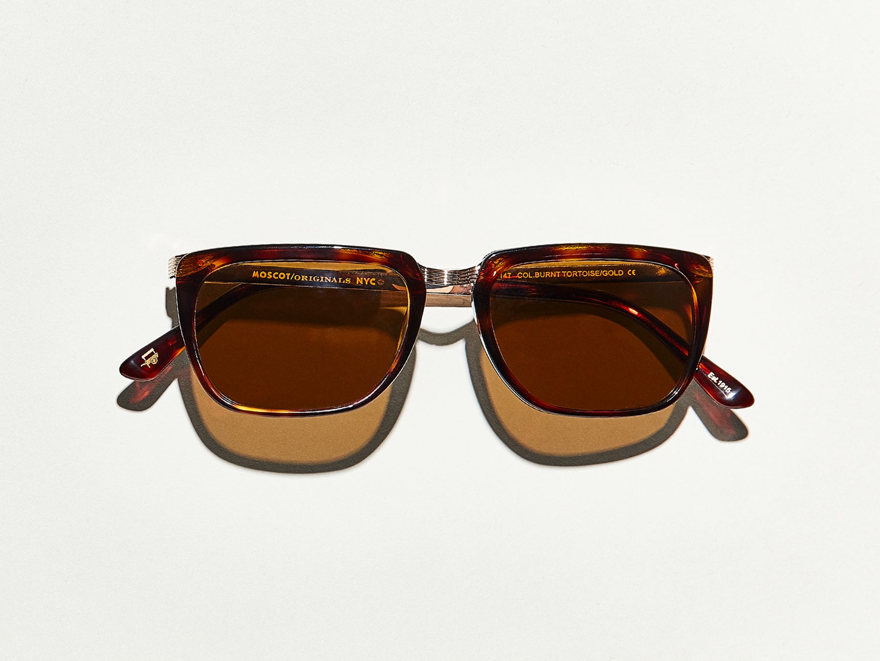The KLUG SUN in Burnt Tortoise/Gold with Cosmitan Brown Glass Lenses