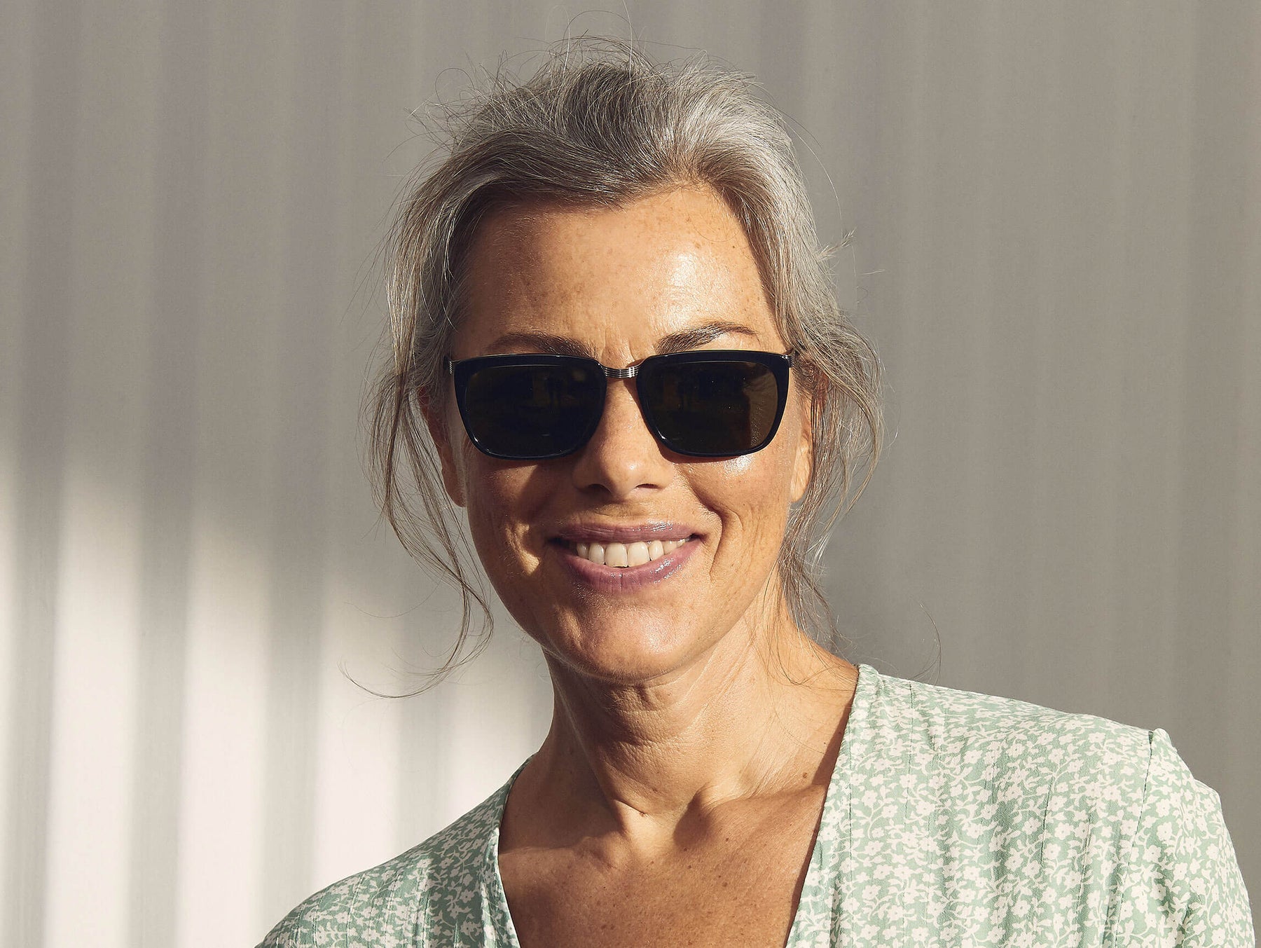 Model is wearing The KLUG SUN in Black/Silver in size 52 with G-15 Glass Lenses