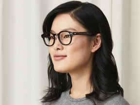 Model is wearing The LEMTOSH w/ Metal Nose Pads in size 49 in Tortoise