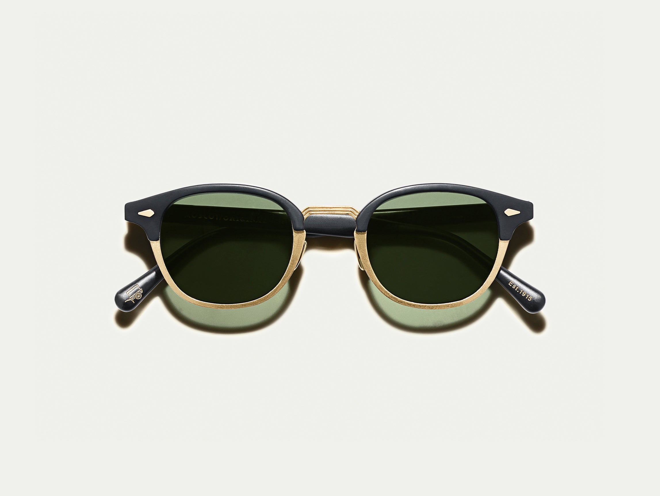 The LEMTOSH-MAC in Black/Matte Gold with G-15 Glass Lenses