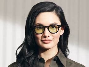 Model is wearing The LEMTOSH in Black in size 46 with Limelight Tinted Lenses