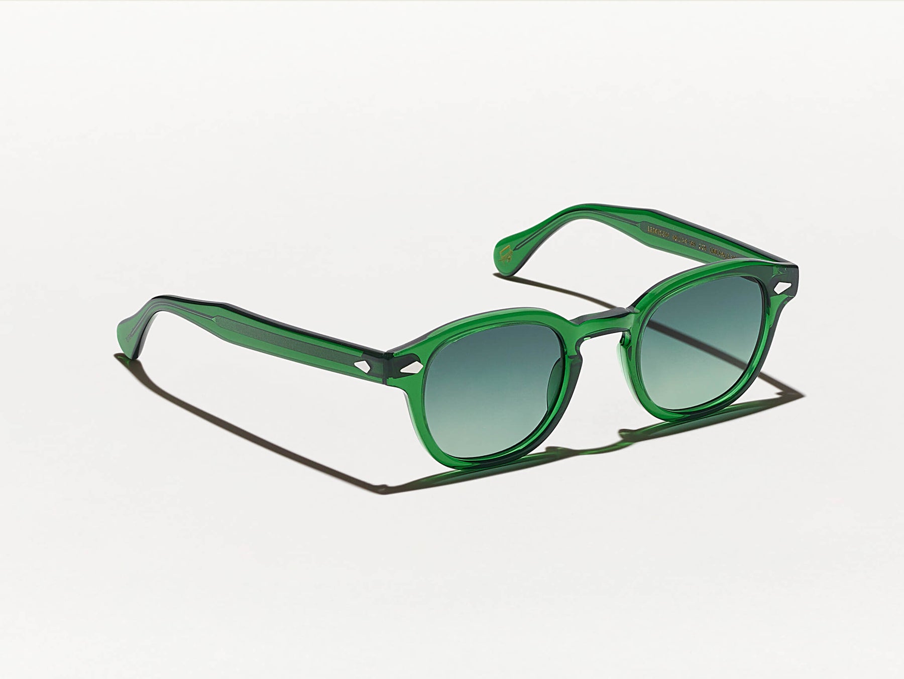 The LEMTOSH in Emerald with Forest Wood Tinted Lenses
