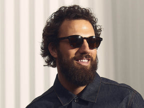 Model is wearing The LEMTOSH SUN-POLARIZED in size 46 in Tortoise with Cosmitan Brown Polarized Glass Lenses