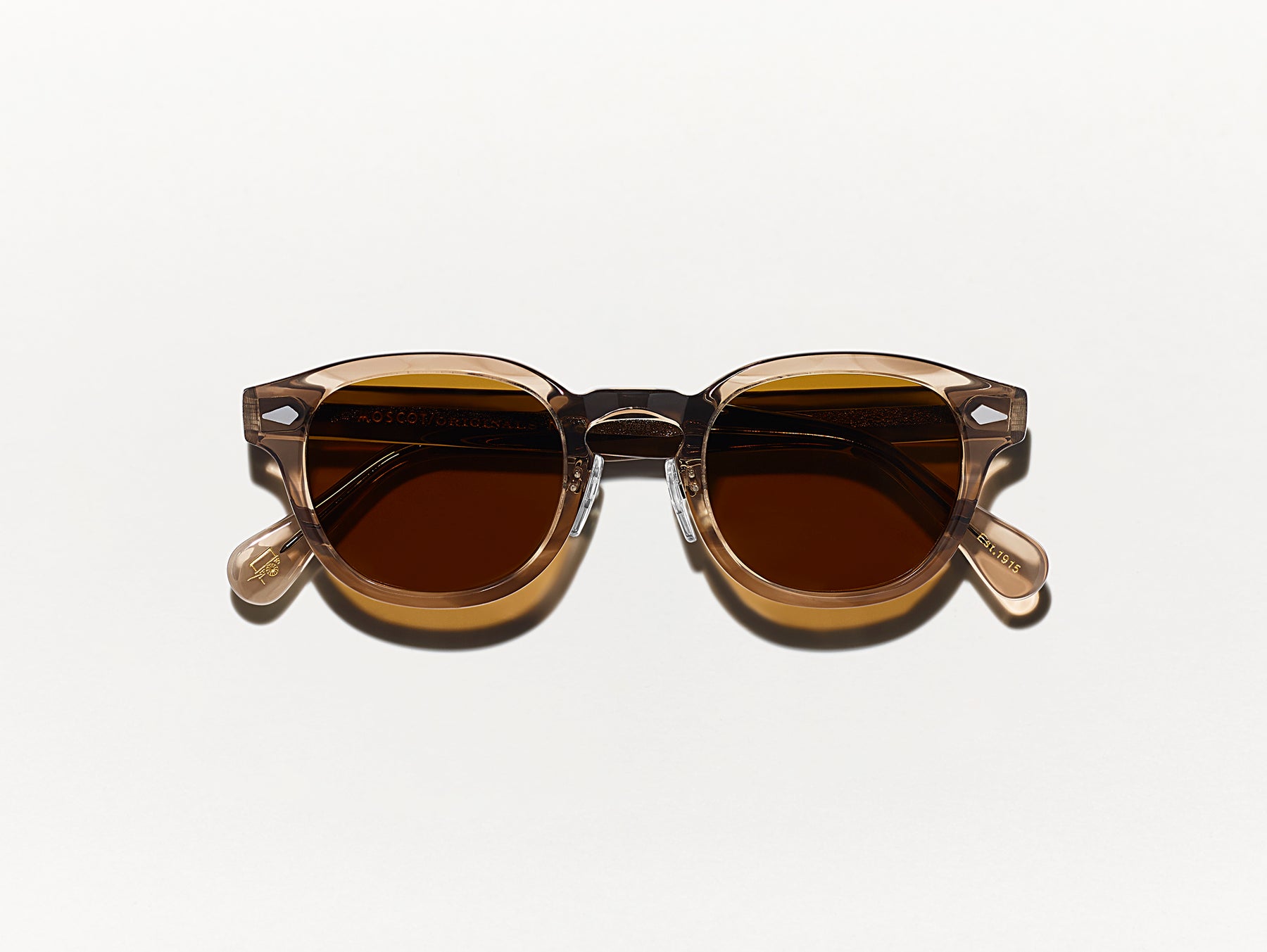 The LEMTOSH SUN with Metal Nose Pads in Brown Ash with Cosmitan Brown Glass Lenses