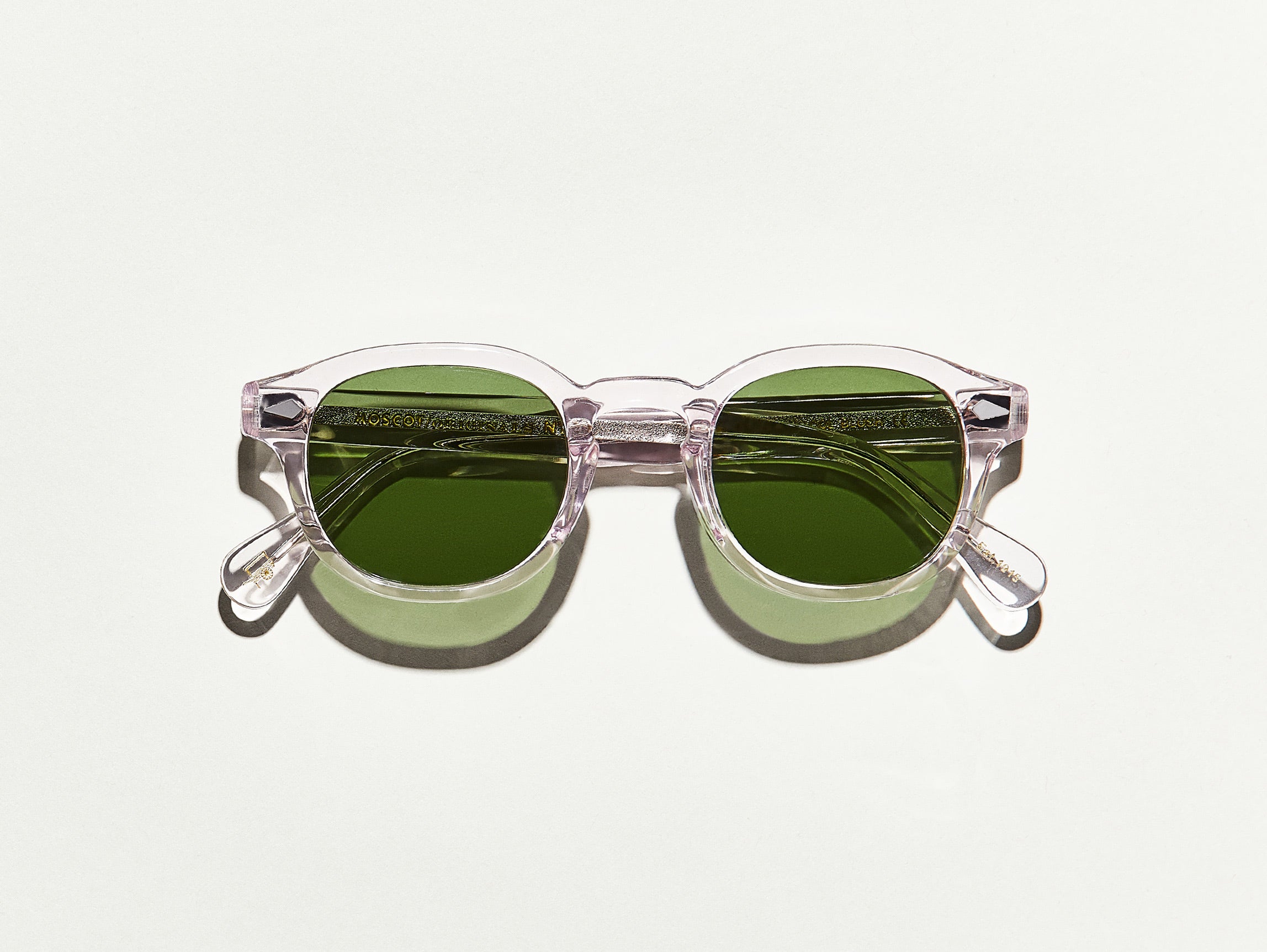 The LEMTOSH SUN in Blush with Calibar Green Glass Lenses