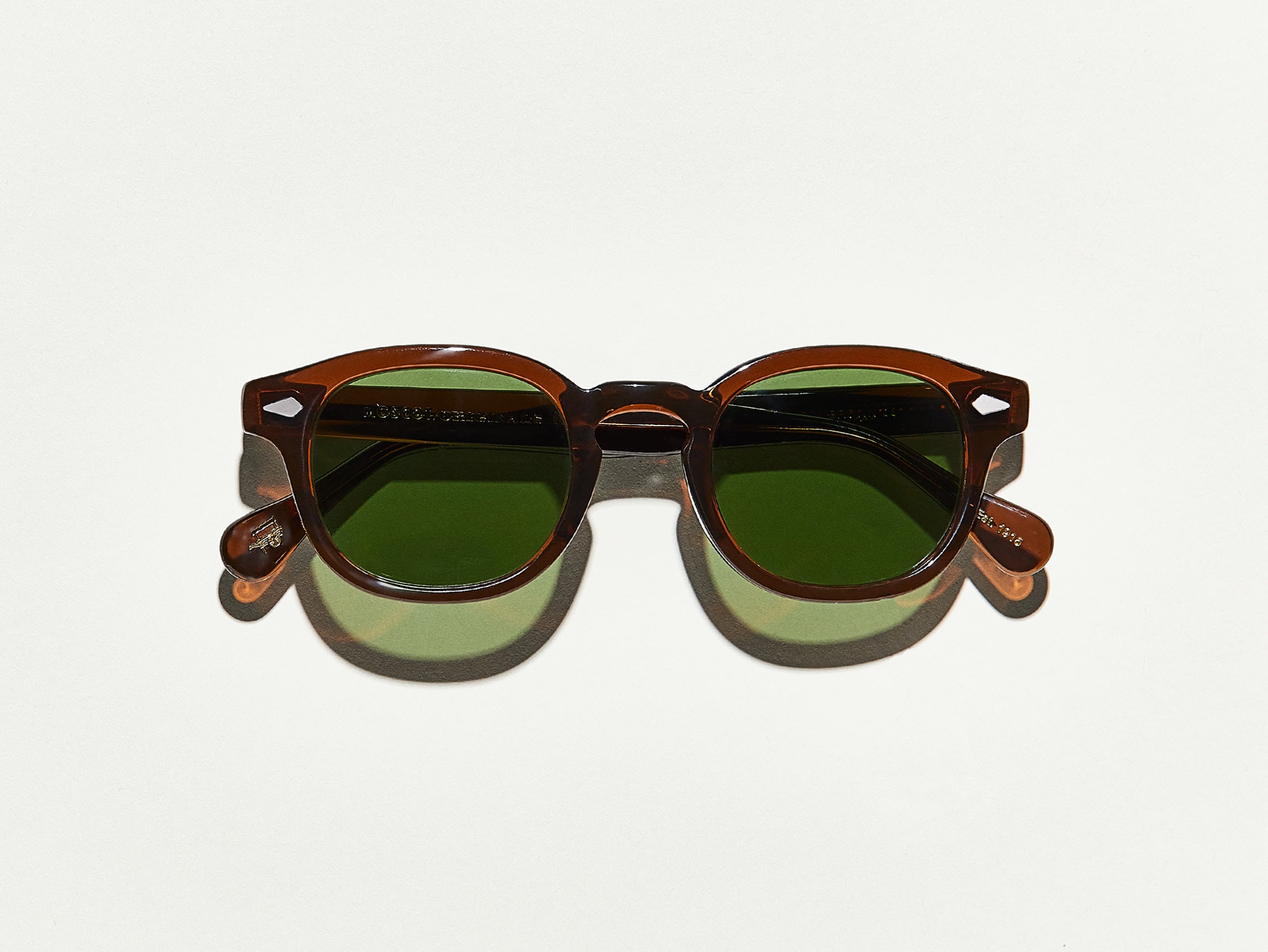 The LEMTOSH SUN in Brown with Calibar Green Glass Lenses