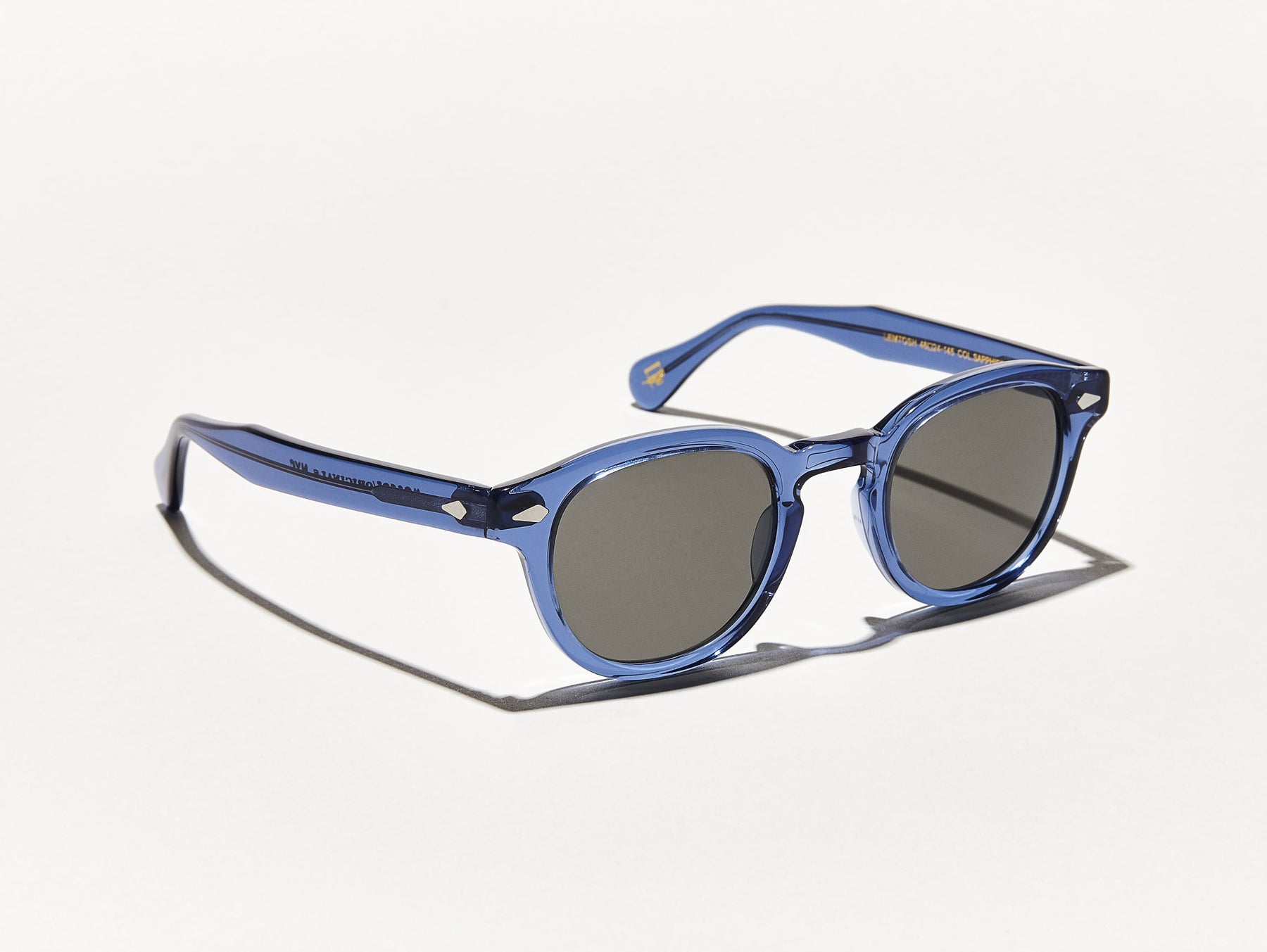 The LEMTOSH SUN in Sapphire with Grey Glass Lenses