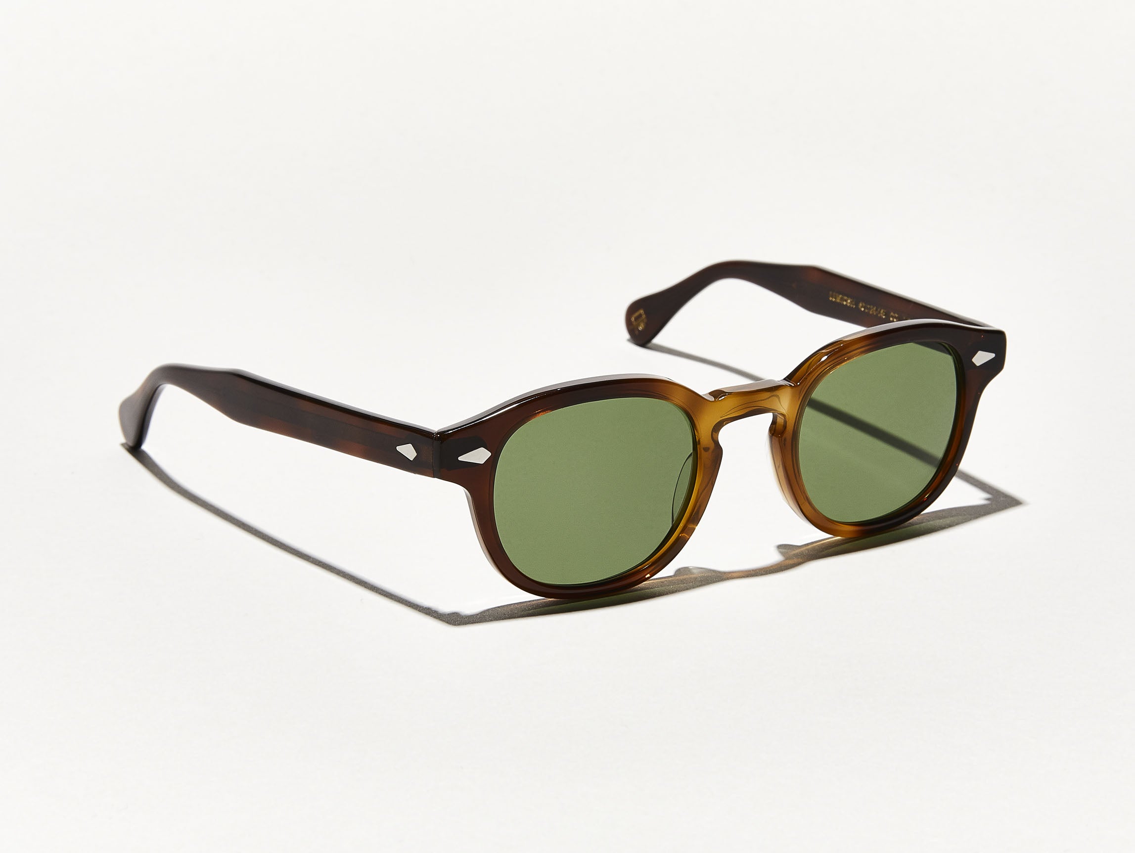 The LEMTOSH SUN in Tobacco with Calibar Green Glass Lenses