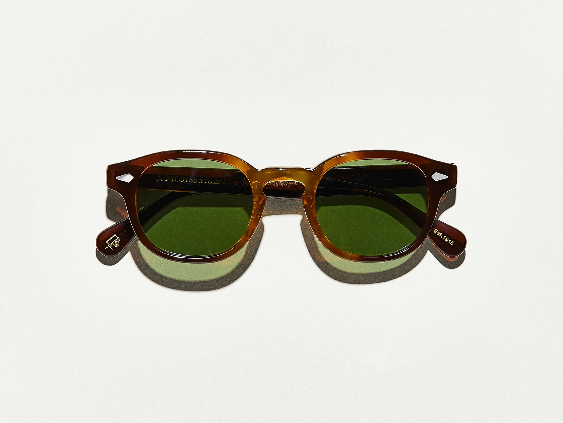 The LEMTOSH SUN in Tobacco with Calibar Green Glass Lenses