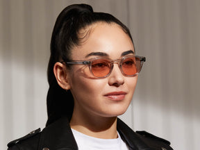 Model is wearing The LEMTOSH in Light Grey in size 46 with New York Rose Tinted Lenses