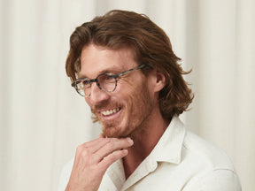 Model is wearing The LES in size 47 in Grey Tortoise