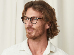 Model is wearing The MILTZEN W/ METAL NOSE PADS in size 49 in Tortoise