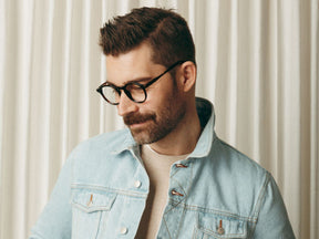 Model is wearing The MILTZEN in Tortoise in size 49 with Blue Protect Lenses