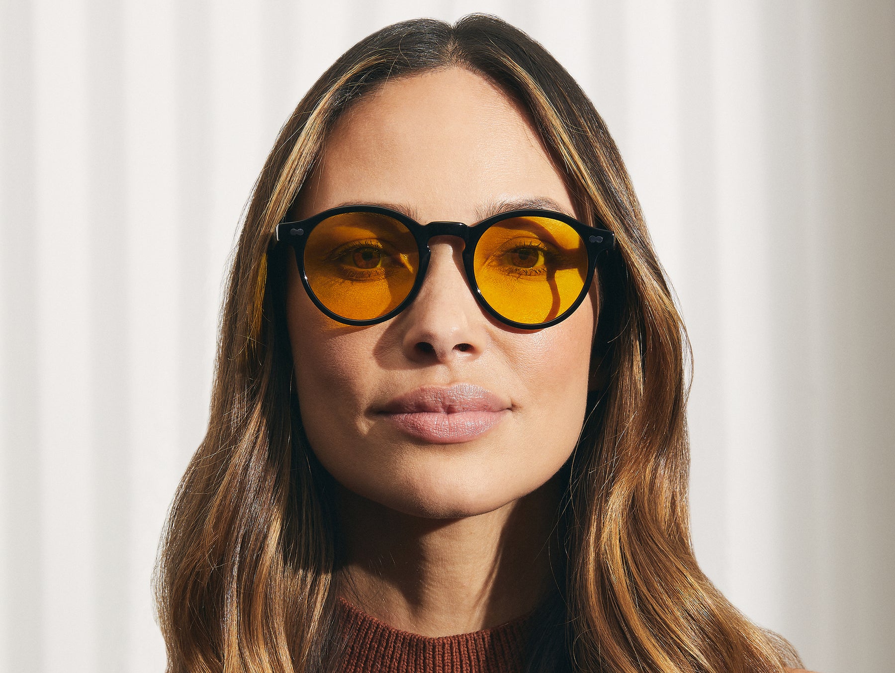 Model is wearing The MILTZEN in Black in size 49 with Mellow Yellow Tinted Lenses