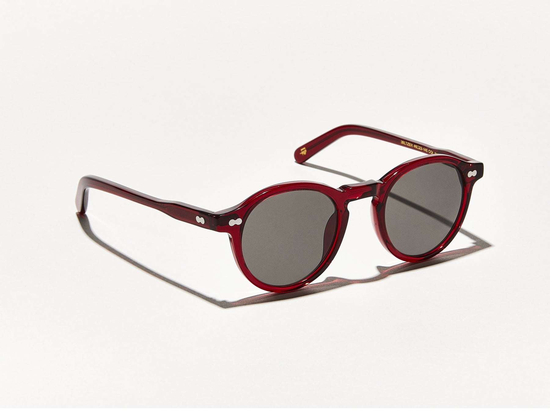 The MILTZEN in Ruby with Grey Glass Lenses