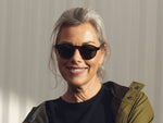 Model is wearing The MILTZEN SUN in Tortoise in size 46 with G-15 Glass Lenses