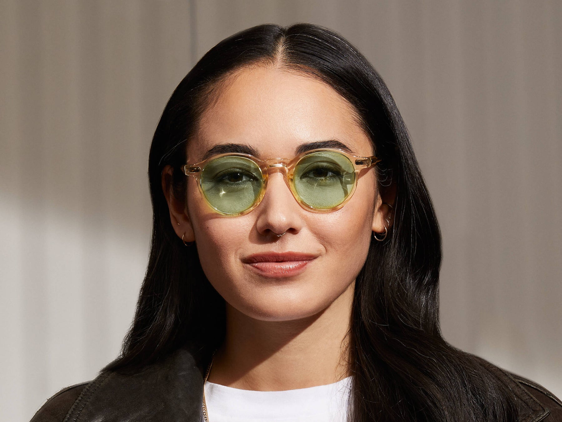 Model is wearing The MILTZEN in Flesh in size 46 with Limelight Tinted Lenses