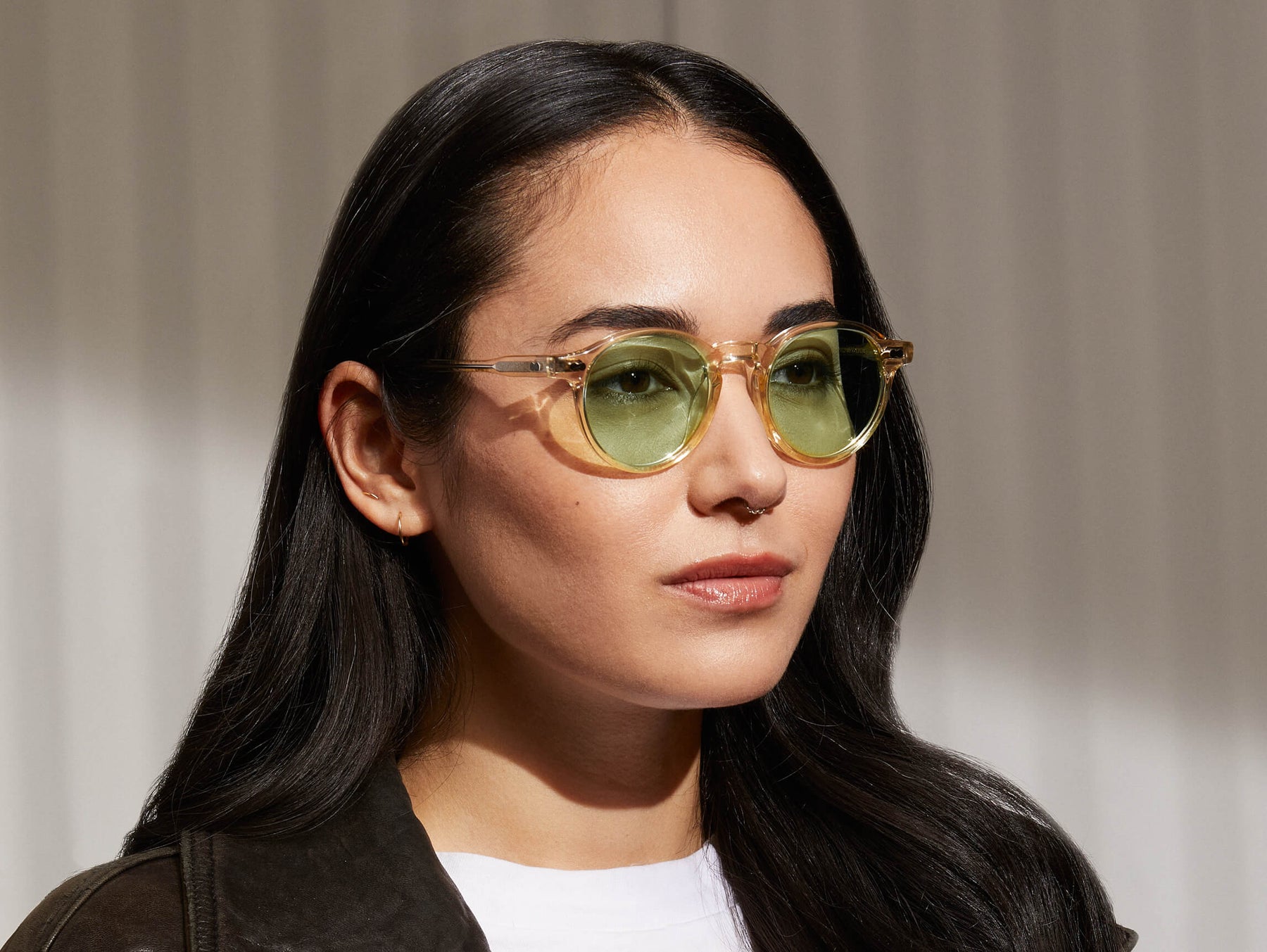 Model is wearing The MILTZEN in Flesh in size 46 with Limelight Tinted Lenses