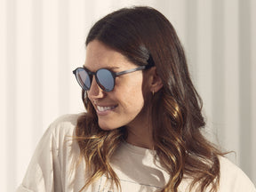 Model is wearing The MILTZEN-T SUN in Charcoal/Wine in size 49 with Silver Flash Mirror Coated Lenses