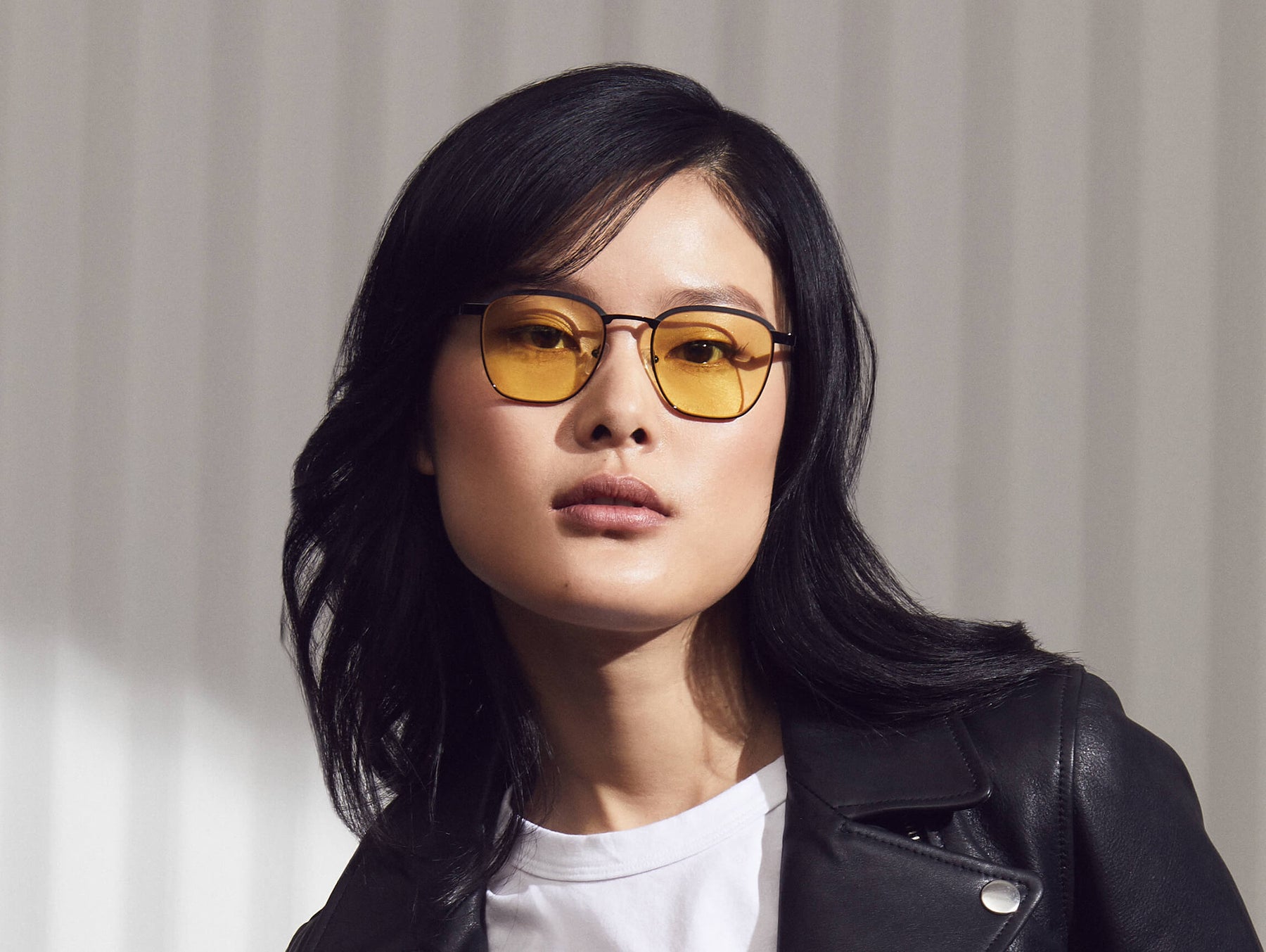 Model is wearing The MISH SUN in Black in size 51 with Yellow Glass Lenses