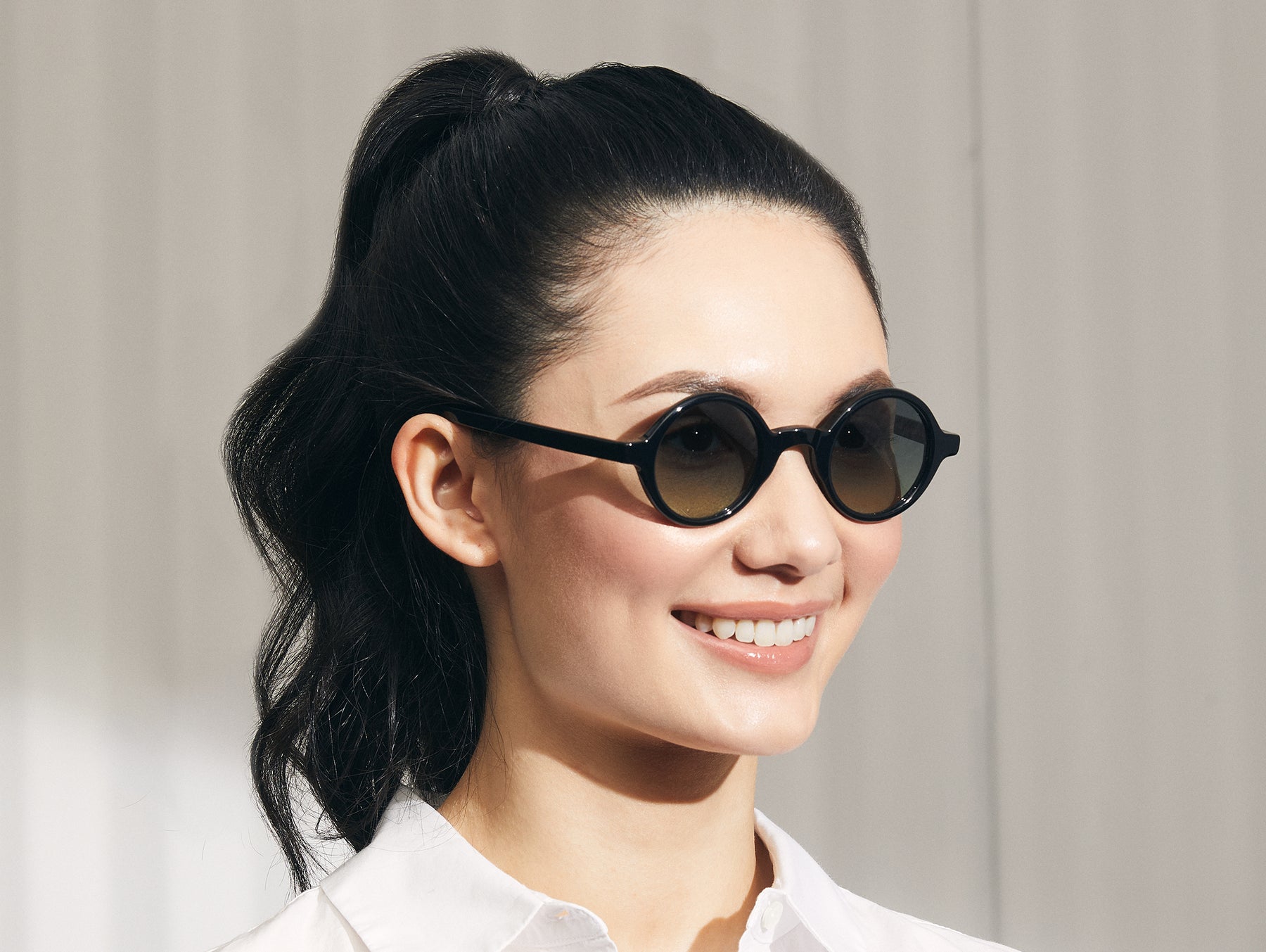 Model is wearing The ZOLMAN in Black in size 42 with Forest Wood Tinted Lenses