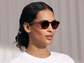 Model is wearing The LEMTOSH in Ruby in size 46 with Cabernet Tinted Lenses