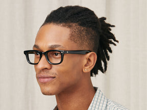 Model is wearing The KLUTZ in size 47 in Black