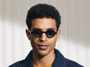 Model is wearing The ZOLMAN in Black in size 42 with Denim Blue Tinted Lenses