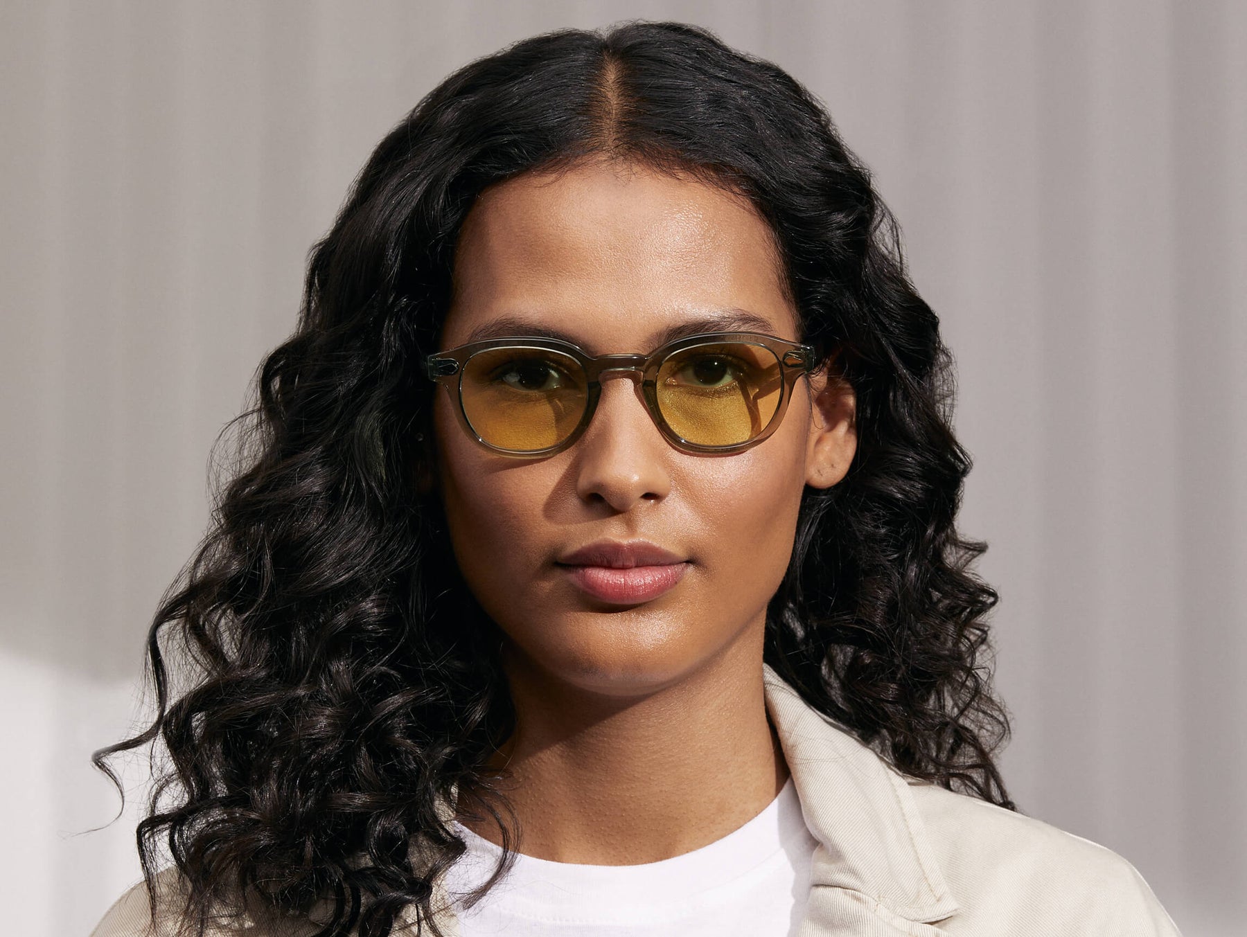 Model is wearing The LEMTOSH in Sage in size 46 with Limelight Tinted Lenses