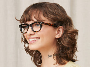 Model is wearing The KLUTZ in size 47 in Tortoise