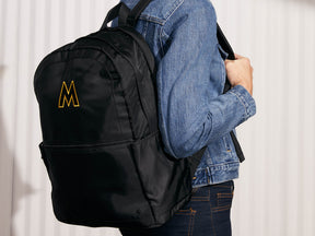 Model is wearing The MOSCOT Backpack