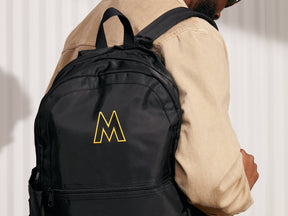 Model is wearing The MOSCOT Backpack