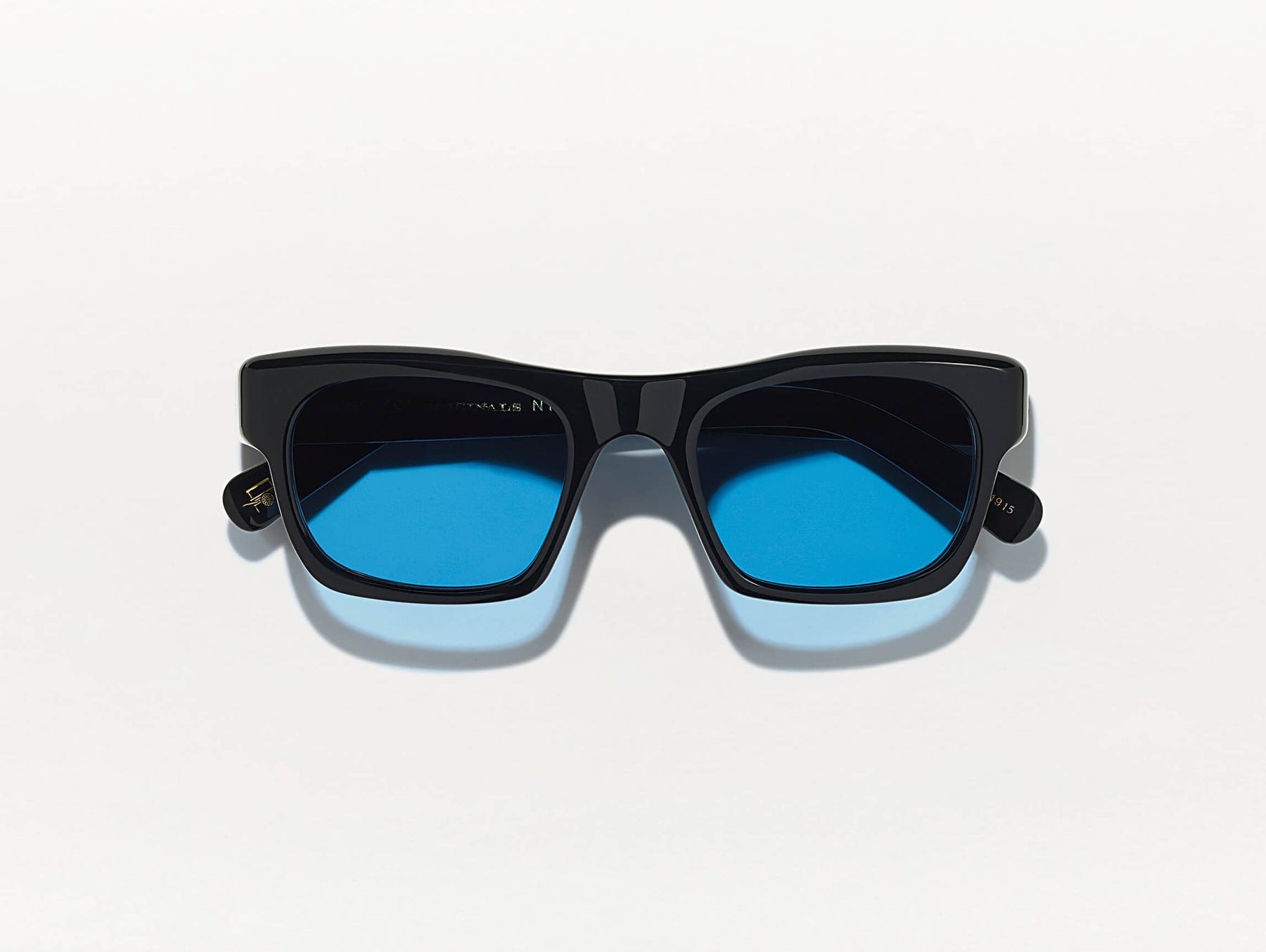 The NUDNIK SUN in Black with Celebrity Blue Tinted Lenses