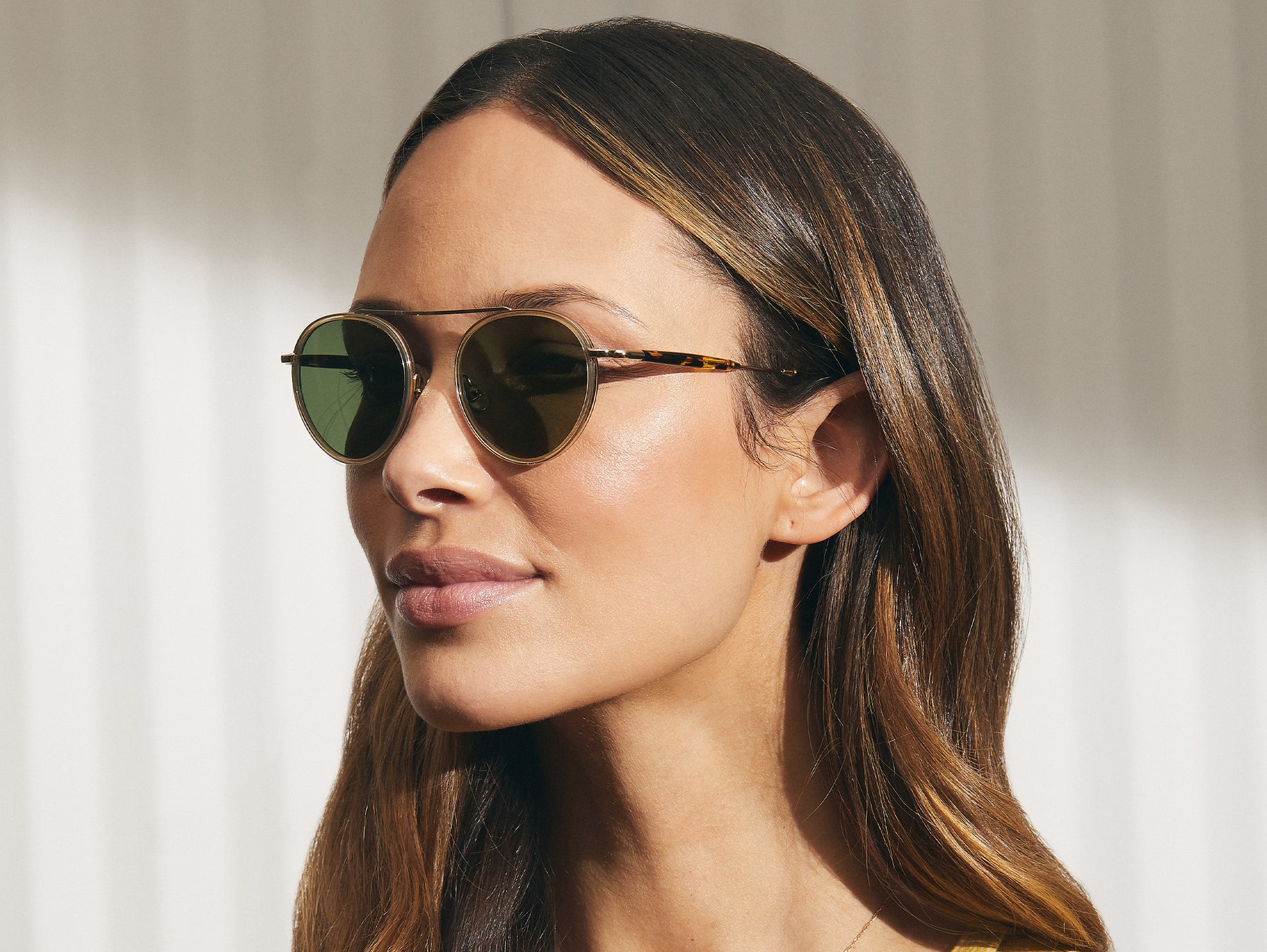 Model is wearing The PUPIK SUN in Citron/Tortoise in size 47 with Green Lenses