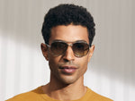Model is wearing The SHAV SUN in Silver in size 59 with Forest Wood Tinted Lenses
