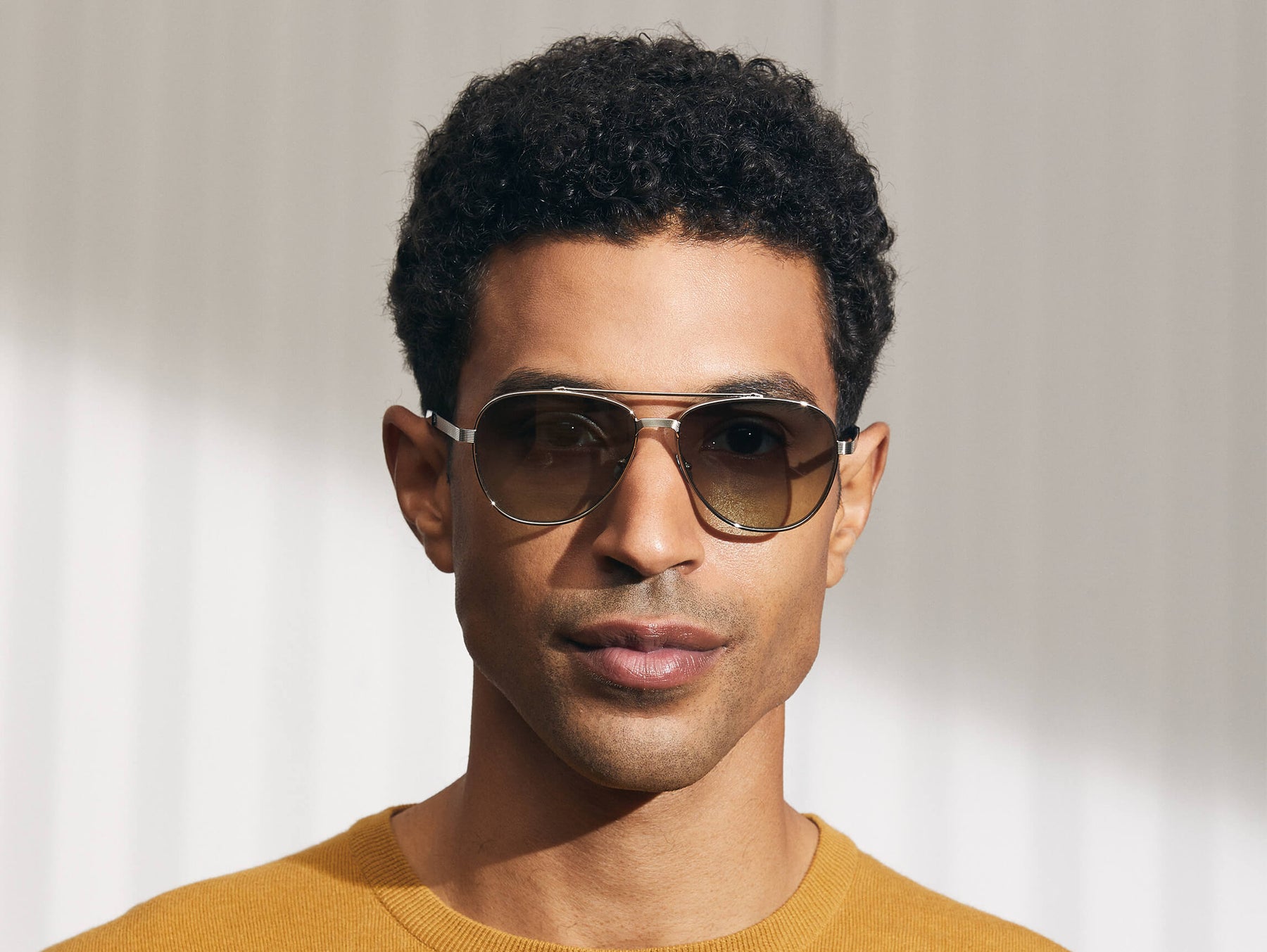 Model is wearing The SHAV SUN in Silver in size 59 with Forest Wood Tinted Lenses
