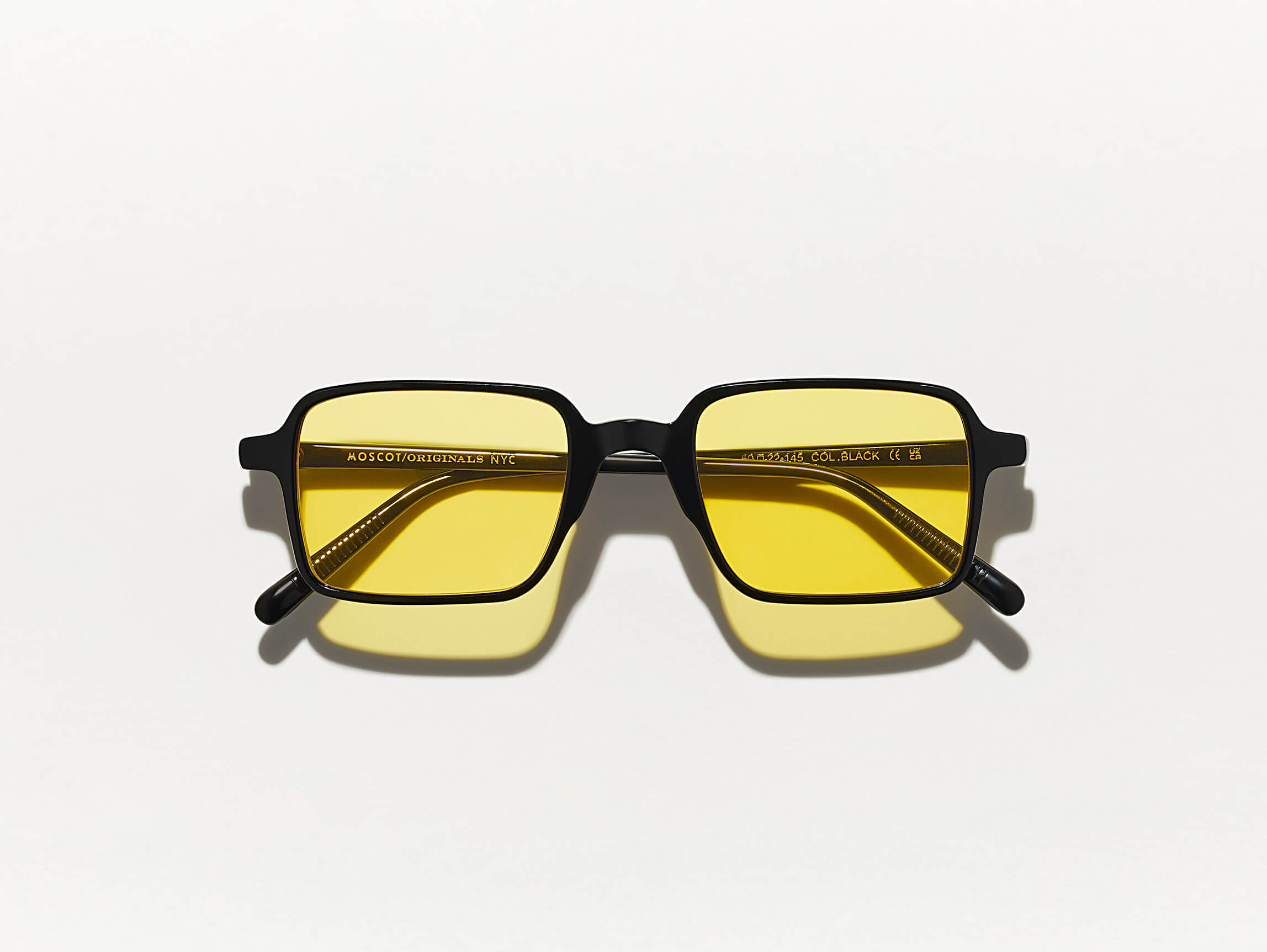 #color_mellow yellow | The SHINDIG Black with Mellow Yellow Tinted Lenses