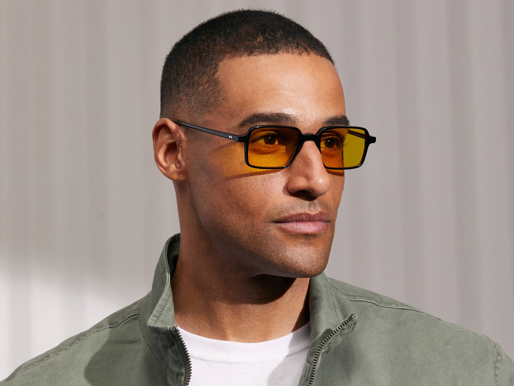 Model is wearing The SHINDIG Black in size 50 with Mellow Yellow Tinted Lenses