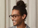 Model is wearing The SHINDIG in size 50 in Tortoise