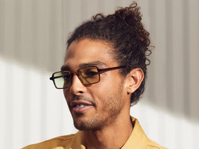 Model is wearing The SHINDIG SUN in Tobacco in size 50 with Limelight Tinted Lenses